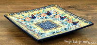 A picture of a Polish Pottery 7" Square Dessert Plate (Butterfly Bliss) | T158S-WK73 as shown at PolishPotteryOutlet.com/products/6-square-dessert-plates-butterfly-bliss
