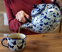 A picture of a Polish Pottery Latte Cup (Night Sky) | F044T-MARM as shown at PolishPotteryOutlet.com/products/large-latte-soup-cups-night-sky