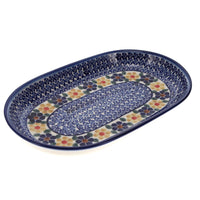 A picture of a Polish Pottery WR 7" x 11" Oval Roaster (Floral Border) | WR13B-WR16 as shown at PolishPotteryOutlet.com/products/7-x-11-oval-roaster-wr16