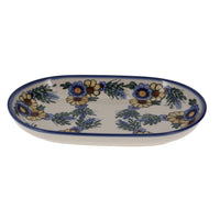 A picture of a Polish Pottery WR 7" x 11" Oval Roaster (Flowers & Tassels) | WR13B-WR5 as shown at PolishPotteryOutlet.com/products/7-x-11-oval-roaster-wr5