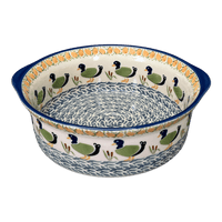 A picture of a Polish Pottery 10" Deep Round Baker (Ducks in a Row) | Z155U-P323 as shown at PolishPotteryOutlet.com/products/deep-round-baker-ducks-in-a-row-z155u-p323