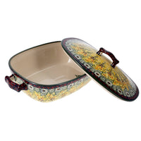 A picture of a Polish Pottery Oval Covered Baker (Sunshine Grotto) | Z161S-WK52 as shown at PolishPotteryOutlet.com/products/oval-covered-baker-sunshine-grotto