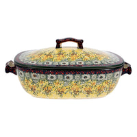 A picture of a Polish Pottery Oval Covered Baker (Sunshine Grotto) | Z161S-WK52 as shown at PolishPotteryOutlet.com/products/oval-covered-baker-sunshine-grotto