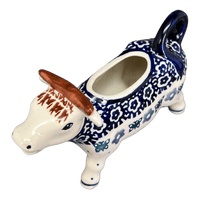 A picture of a Polish Pottery Cow Creamer (Butterfly Border) | D081T-P249 as shown at PolishPotteryOutlet.com/products/cow-creamer-butterfly-border-d081t-p249