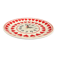 A picture of a Polish Pottery 10" Round Plate Wall Clock (Whole Hearted Red) | Z144T-SEDC as shown at PolishPotteryOutlet.com/products/10-round-plate-wall-clock-whole-hearted-red-z144t-sedc