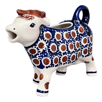 A picture of a Polish Pottery Cow Creamer (Chocolate Drop) | D081T-55 as shown at PolishPotteryOutlet.com/products/cow-creamer-chocolate-drop-d081t-55